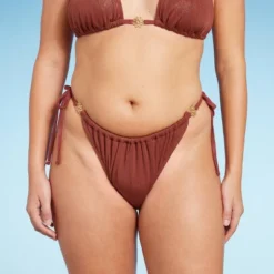 Women's Side-Tie Adjustable Extra High Leg Lurex Plisse Textured Bikini Bottom - Wild Fable™ 12 Women's Side-Tie Adjustable Extra High Leg Lurex Plisse Textured Bikini Bottom - Wild Fable™ -Target GUEST cee21781 20fd 450e 8ef1 9194ba52deb3
